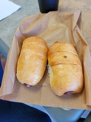 Kolaches, the spicy one has the dot in the center