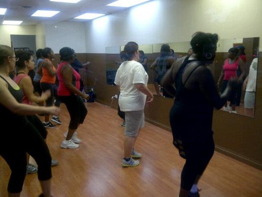 Tasha leading a full house of Zumbaholics in a high calorie burning session.