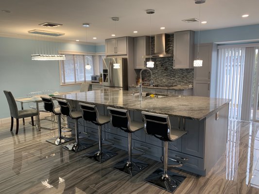 Contemporary kitchen - header installed to create open concept