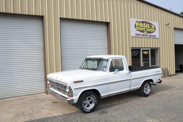 Ford F100 Restoration in front of the shop.