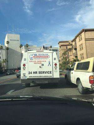 Driving extremely erratic; cutting from lane to lane, nearly side swiping a half dozen cars, cutting off on coming traffic on a busy street.