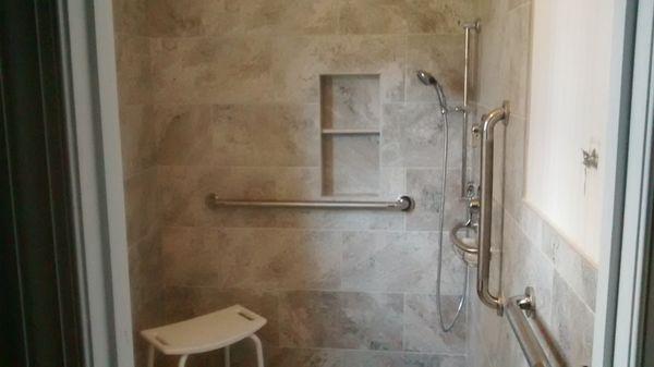 Grab Bars and Hand shower.