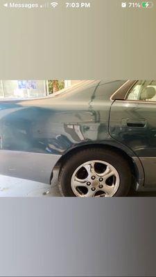 Additional touch up to repel rust above the wheel and behind the back passenger door panel.