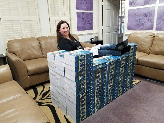 Angela's new desk. This is just one-fourth of the textbooks we will use the year for  our SAT prep classes!