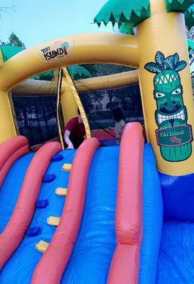 My son showing my 2 year old how to use the slide. This bounce house was perfect for small children!!