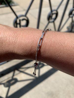 Love this simple and secure link bracelet. It fits any size wrist and can be worn alone or with another.