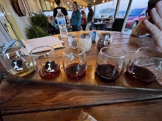 Wine flight in the outdoor seating area