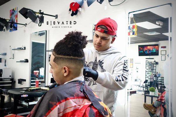 Mid fade by @2kbarber_