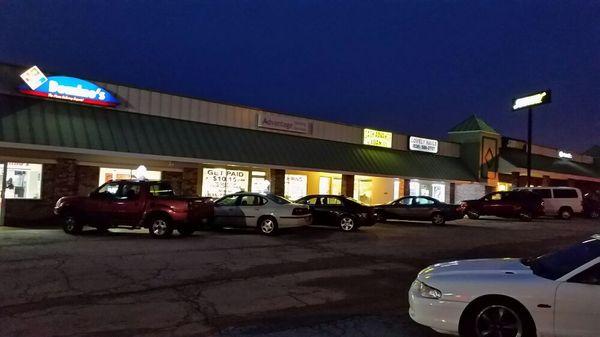 Our Payday Loan office between Domino's and Subway in DeSoto.