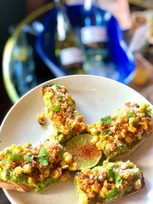 Avocado Toast w/ a street corn flare. Bucket of bubbly not included.