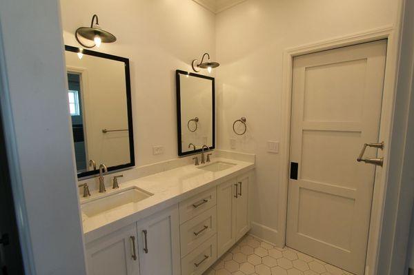 Jack and Jill bathroom .. Custom cabinets and hexagon ceramic tile