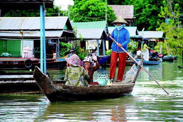 Floating Village in Cambodia.  Call CruiseStar. com Today!