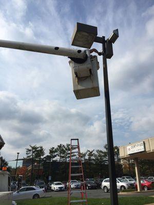 Installing and painting light poles