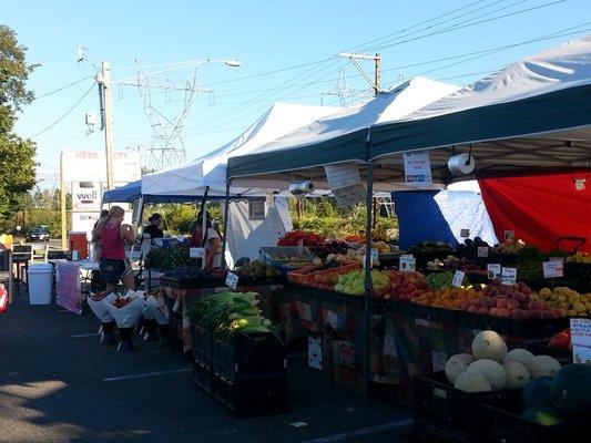 Beautiful produce and fresh flowers at the market.