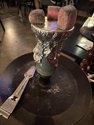 Dirty presentation. Clean the tray at least before bringing the hookah out to the customer.