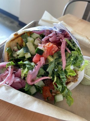 Gyro with chicken and pickled onions