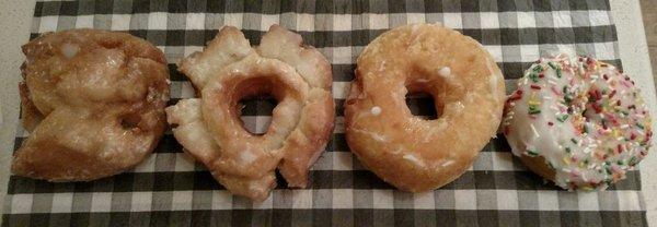 Left to right... buttermilk bar, old fashioned, glazed, and a cake donut with vanilla frosting and rainbow sprinkles