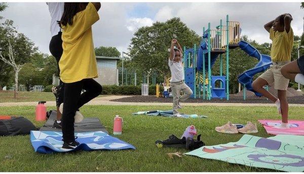 Open space, we used it for yoga. Big kid play space and restrooms are in the background.