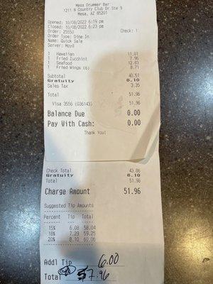 Receipt showing misdirection gratuity automatically added.