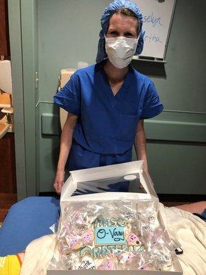 M. Susan Scanlon, MD, NCMP, FACOG receives thank you cookies from patient