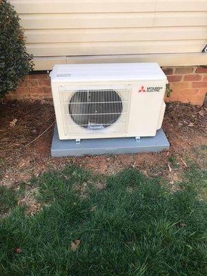 Mitsubishi Mini Split Heat-Pump Bolted to Plastic Pad