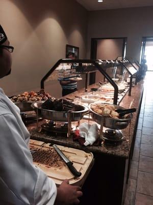 You can travel far and wide but this Father's Day buffet is spectacular.  The tenderloin you can cut with a fork.