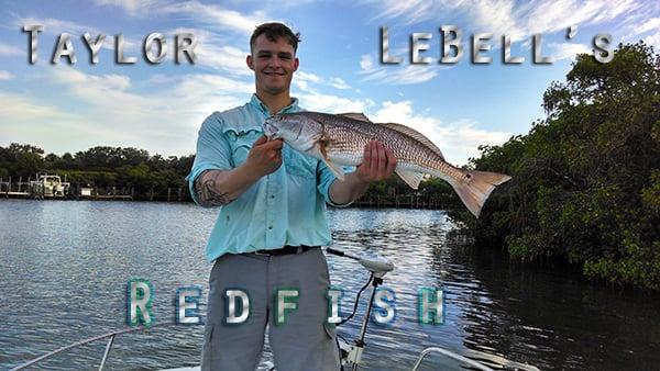 Captain Paul's grand-son with his redfish.