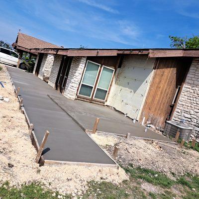 concrete patio and extension for bathroom