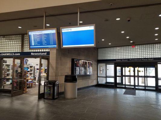 Electronic boards on two sides of waiting area