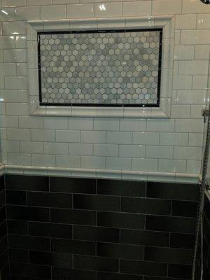 Retro Subway Tile with Carrara Stone Mosaic.