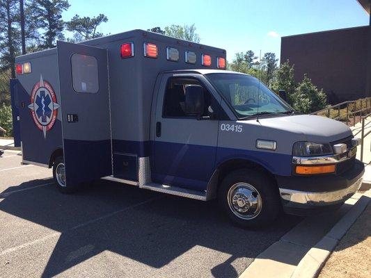 Showing off our ambulance at a touch-a-truck at the Post Rd Library !