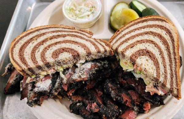 Pastrami on marbled rye w/cole slaw & pickles. Bought 2 B&W cookies too, not pictured (5/6/24).