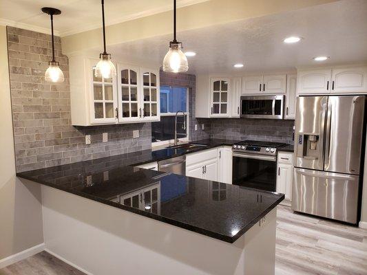 Kitchen after.  The backsplash really makes the room.