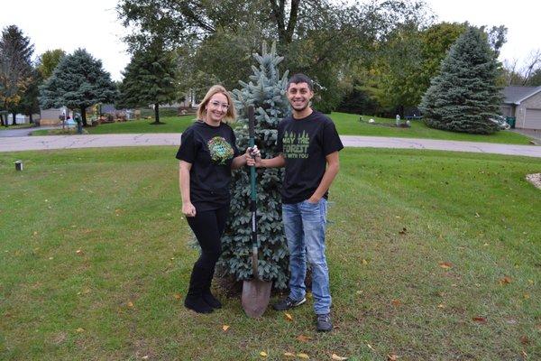 April 22, 2021 Earth Day. Sustainable Staffing family planting trees.