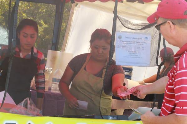 cooking at stand at festival