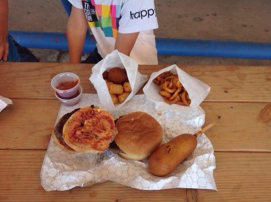 Burger, bacon cheeseburger, for dog and various fried sides.