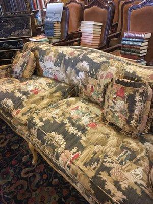 Sweet little down stuffed English sofa. The fabric is to die for.