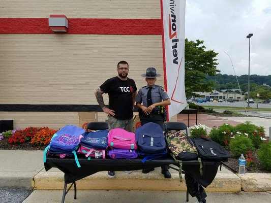 Backpack giveaway 2016. Helping kids and parents in the local community get school supplies.