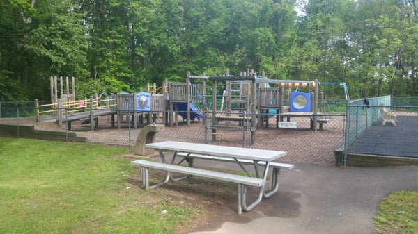 5 to 12 year old playground.  With very original play structures.  Enriching even to grownups.