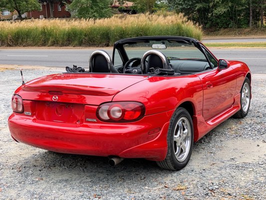 Red convertible Miata