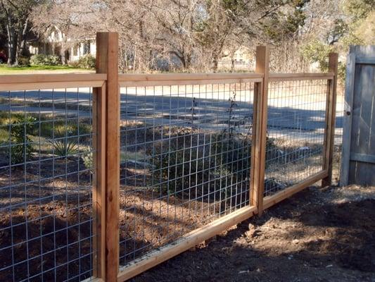 Bull wire fencing with cedar frame.  Rustic yet beautiful.