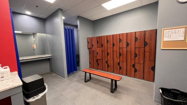 Women's locker room with showers & changing area