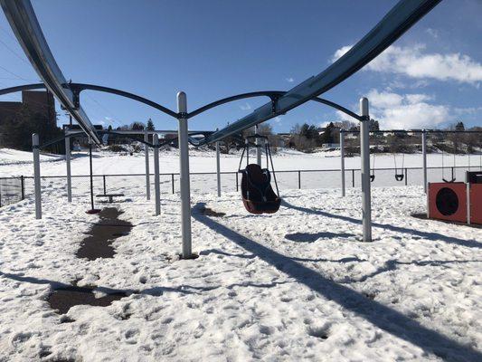 Fun swings on a track for everyone to enjoy