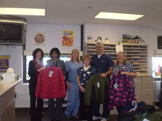 Dr.Kohl and Staff delivering coats to Hannah Ashton School for our annual Hoilday Fundraiser.