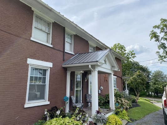 New metal porch roof