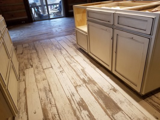 Porcelain Tile Planks with painted and glazed cabinets