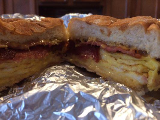 Bacon, egg, and cheese breakfast sandwich (on a roll)