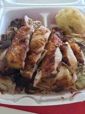 Jerk chicken and pork over rice and peas. Dumpling. $13