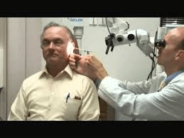 Mark Sanford, Audiologist fitting Lyric invisible Hearing aid