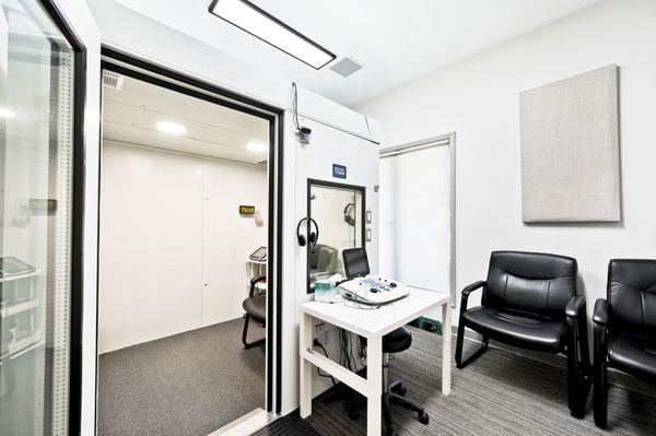 Wheelchair accessible sound booths with large windows in each testing room.